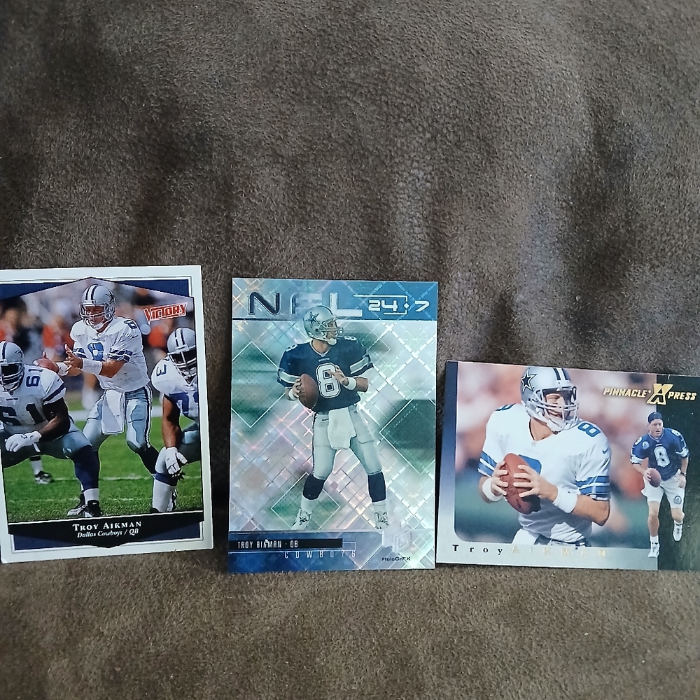 Lot of 3 Troy Aikman football cards.